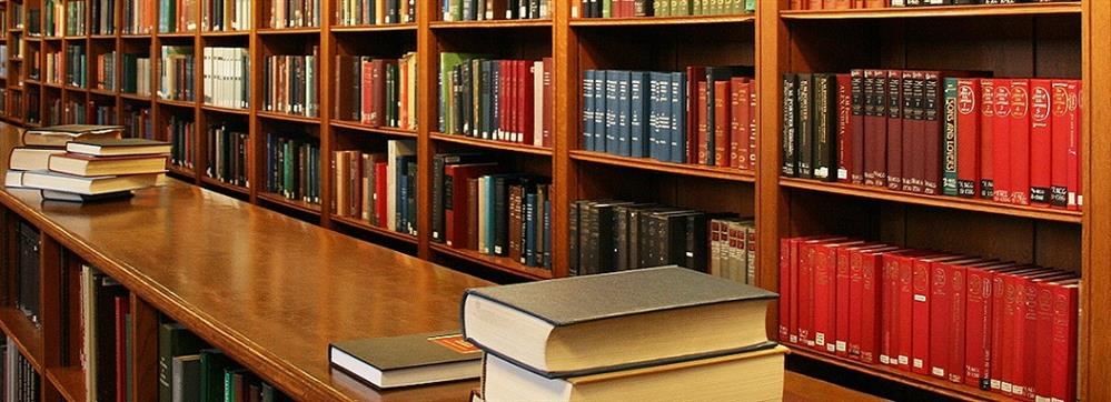 Library shelves with books